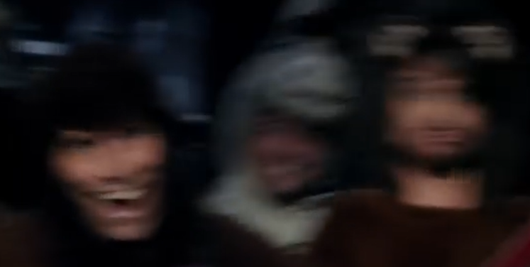 a screengrab from something featuring three blurred faces. where are they from?