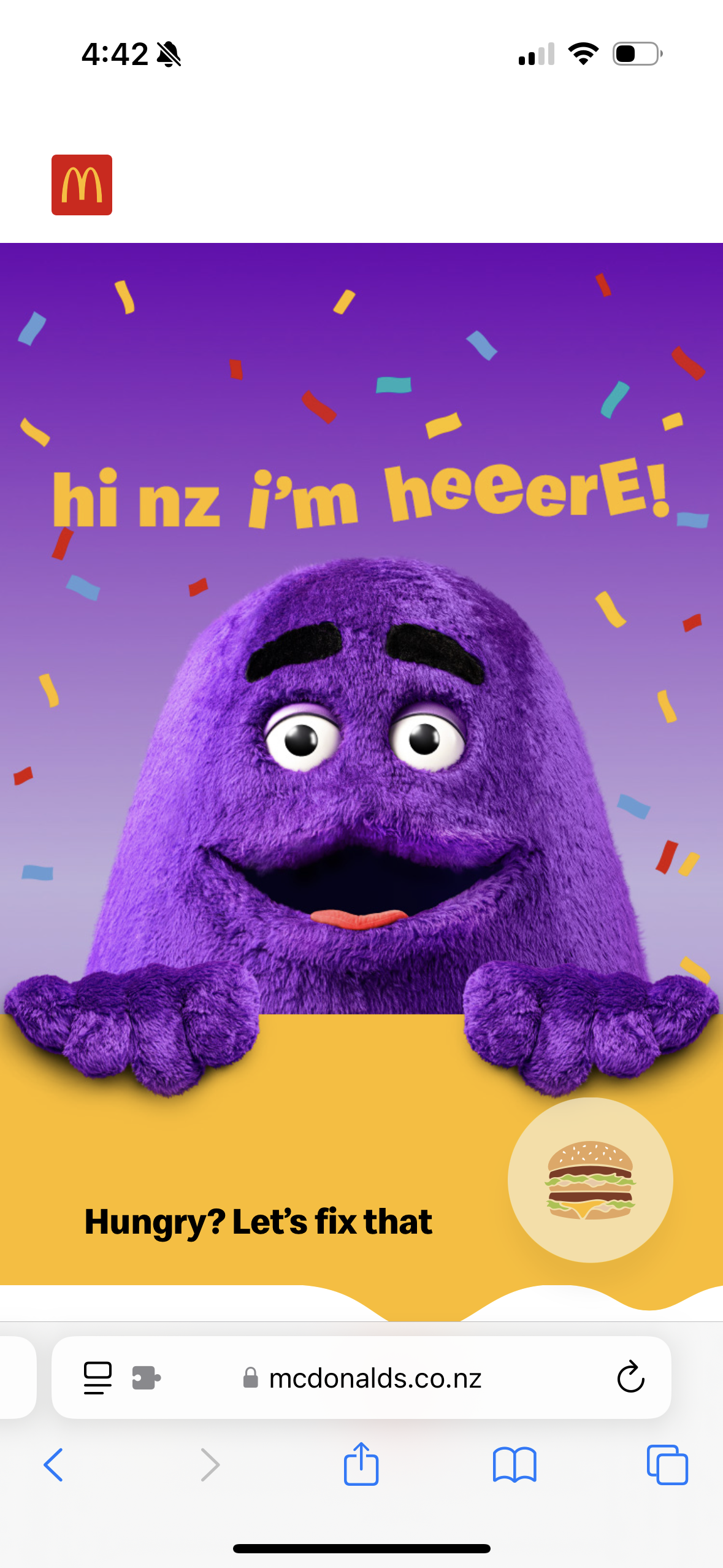 A screenshot of the McDonalds New Zealand website with a promotion for the Grimace Shake featuring Grimace saying “hi nz i'm heeerE!”